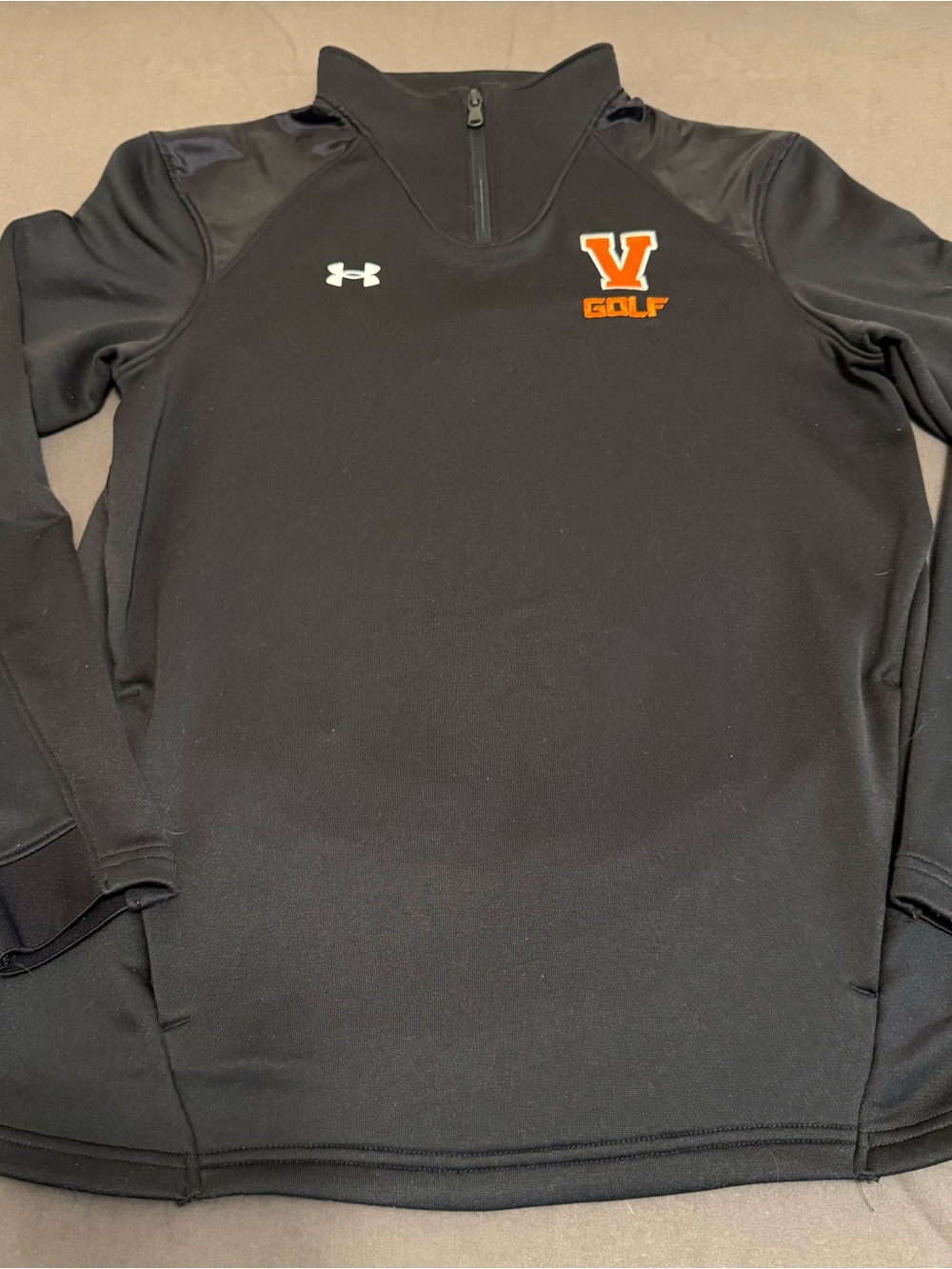 Under Armour women ‘s Black Quarter-Zip Golf Pullover with Orange V Golf Logo